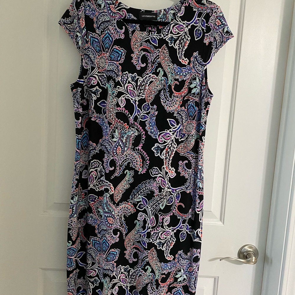 Beautiful multi color patterned dress, size 12. Very Comfy, like new.